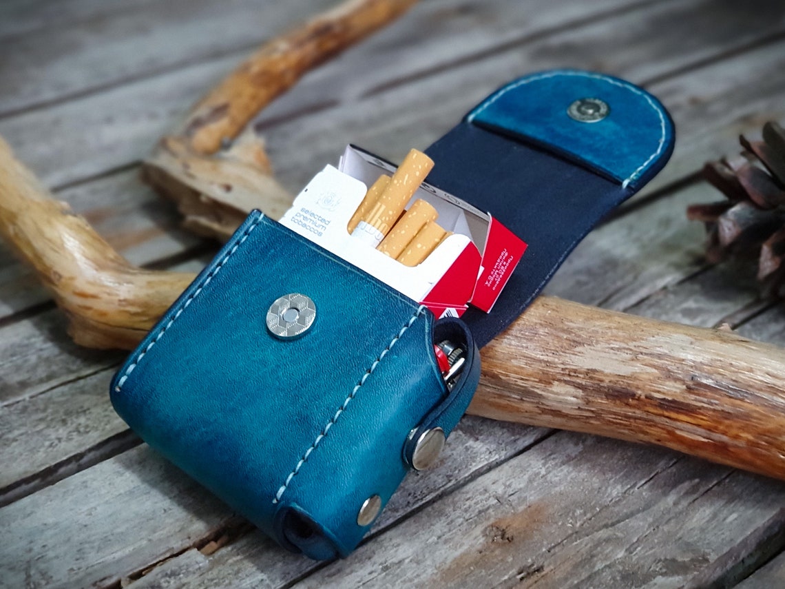 blue leather tobacco pouch with lighter case paper holder and